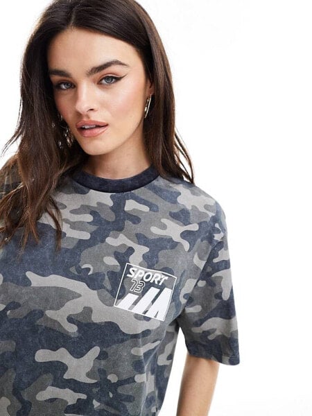 ASOS DESIGN oversized t-shirt with graphic in washed camo print