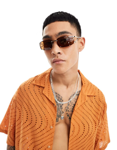 ASOS DESIGN rimless sunglasses in gold with brown lens