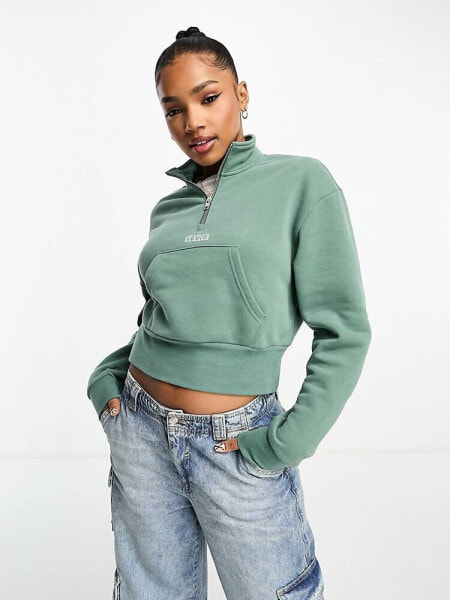 Levi's cropped half zip with small logo in green