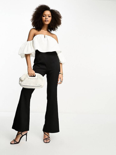In The Style bardot puff sleeve flared jumpsuit in black and white