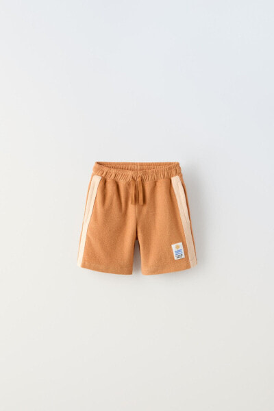 Terry bermuda shorts with contrast label