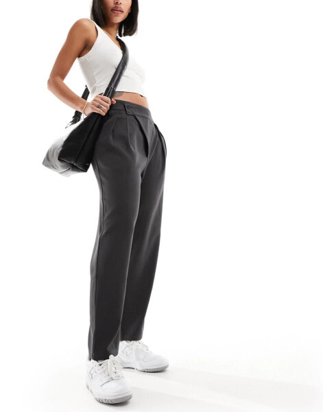 ASOS DESIGN tailored tapered trousers with asymmetric waist in charcoal