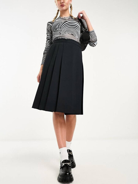 ASOS DESIGN knee length pleated midi skirt in black