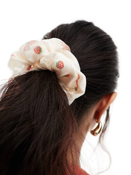 ASOS DESIGN scrunchie hair tie with strawberry design in cream