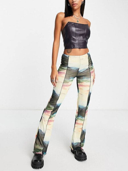 Neon & Nylon frill hem mesh flared trousers in abstract print