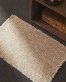 Textured non-slip bath mat
