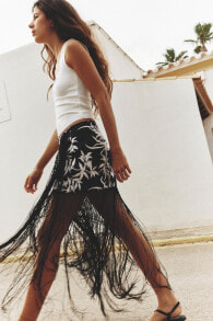 Embroidered pareo skirt with fringing