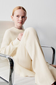 Knitted dresses and trousers for girls