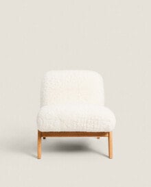 Upholstered faux fur armchair