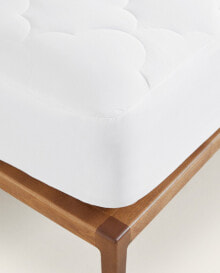 Mattress pads and mattress covers