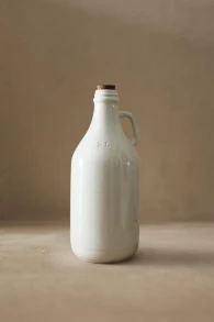 Refillable ceramic bottle