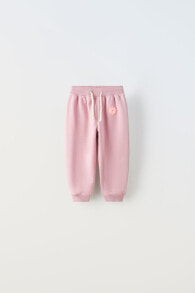 Plush trousers with raised detail