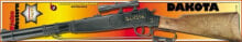 Бластеры, автоматы и пистолеты Игрушечная самовзводная винтовка Dakota с оптическим прицелом. Тип пистонов: 100 зарядные. Длина 64 см. От 8 лет. Металл и пластик.