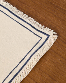 Cotton placemat with fringing