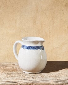 Earthenware jug with line design