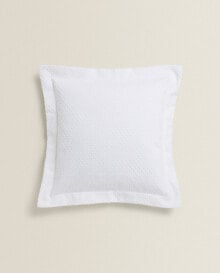Cushion cover with polka dot design