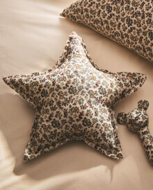 Floral print fabric children’s star cushion