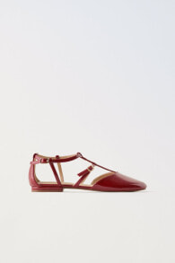 Patent-finish ballet flats with straps