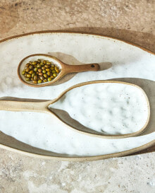 Spoon with raised design