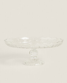Glass serving dish with stand and a raised design