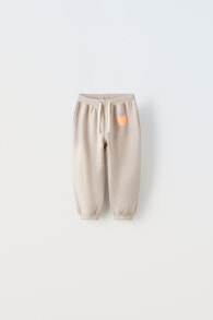 Plush trousers with raised detail