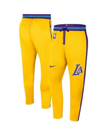 Nike men's Gold Los Angeles Lakers 2021/22 City Edition Therma Flex Showtime Pants