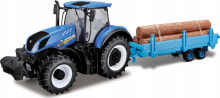 Teka New Holland T7.315 z przyczep± i belami słomy