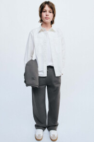 True neutrals plush trousers with darts