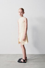 Knit dress with overlay detail