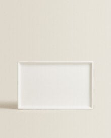 White earthenware bathroom tray