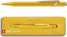 Письменные ручки caran d`Arche Długopis CARAN D&#039;ACHE 849 Goldbar, M, w pudełku, złoty