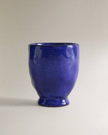 Blue toothbrush holder