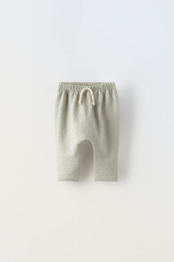 Textured sarouel trousers