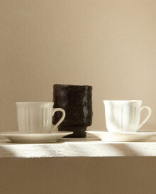 Porcelain coffee cup and saucer