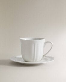 Porcelain teacup and saucer