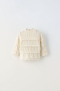 Knitted sweaters for newborns