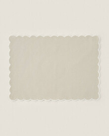 Scalloped cotton and linen placemat