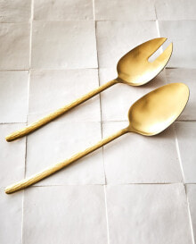 Set of serving cutlery with hammered handle