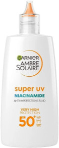 Sonnenschutzlotion - Garnier Ambre Solaire Super UV Niacinamide Fluid SPF50