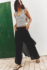 Pareo trousers with buckle
