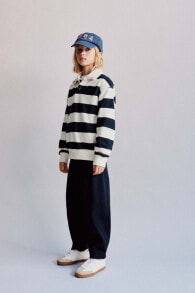 Striped polo shirt and balloon trousers co-ord