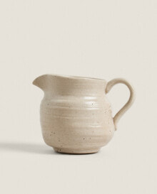 Ceramic jug with handle