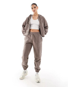 Купить женские брюки The Couture Club: The Couture Club co-ord emblem relaxed joggers in brown