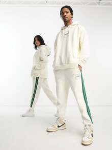 Женские спортивные костюмы ellesse community club unisex joggers in off white