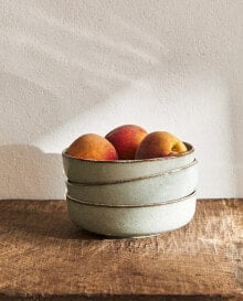 Porcelain bowl with antique finish rim