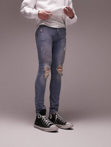 Topman – Hautenge Jeans in mittlerer Waschung mit Farbverlauf mit auffälligen Zierrissen