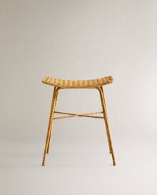 Metal stool with woven rattan