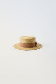 Boater hat with bow