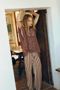 Striped cutwork trousers