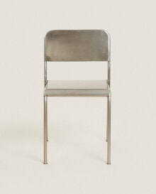 Textured steel chair